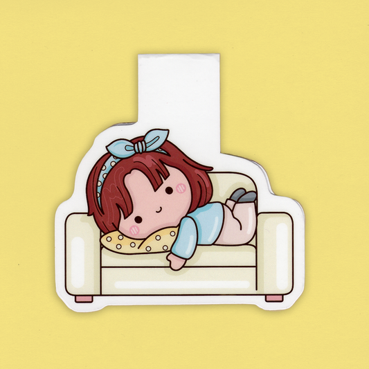 Kirjanmerkki - Söpö tyttö sohvalla