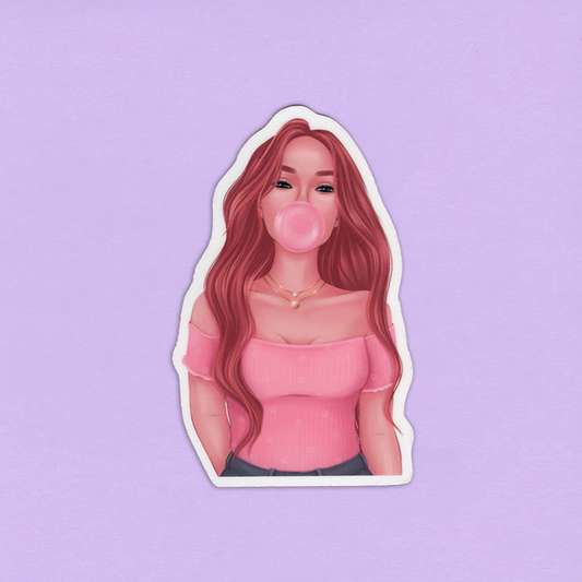 Laminoitu tarra, jossa on punahiuksinen tyttö, joka on pukeutunut vaaleanpunaisiin vaatteisiin ja puhaltaa purkkapalloa.